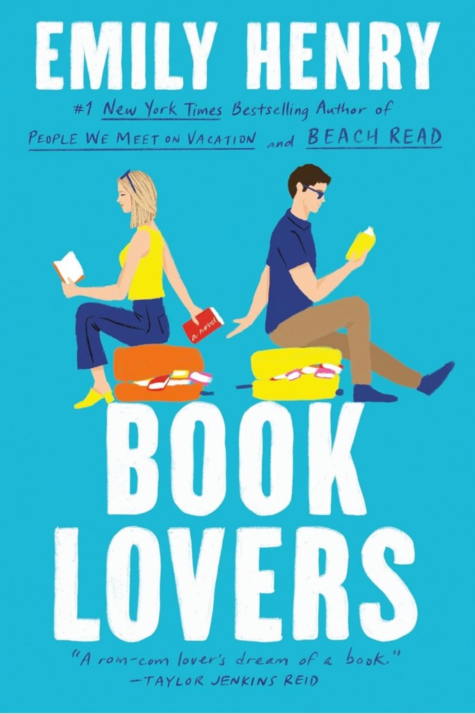 Cover of 'Book Lovers' by Emily Henry, featuring two characters sitting back-to-back, each holding a book, against a bright blue background.